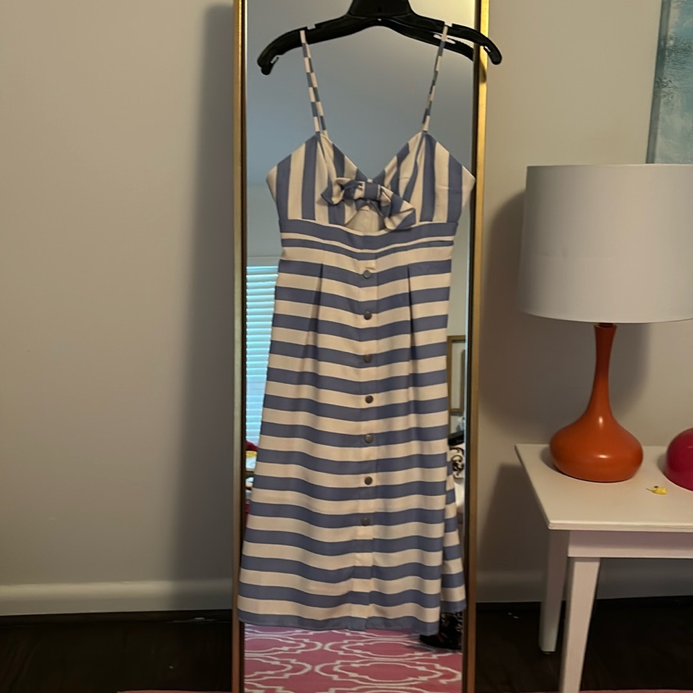 Sprng/Summer dress like new never work because it was too small in bust for me